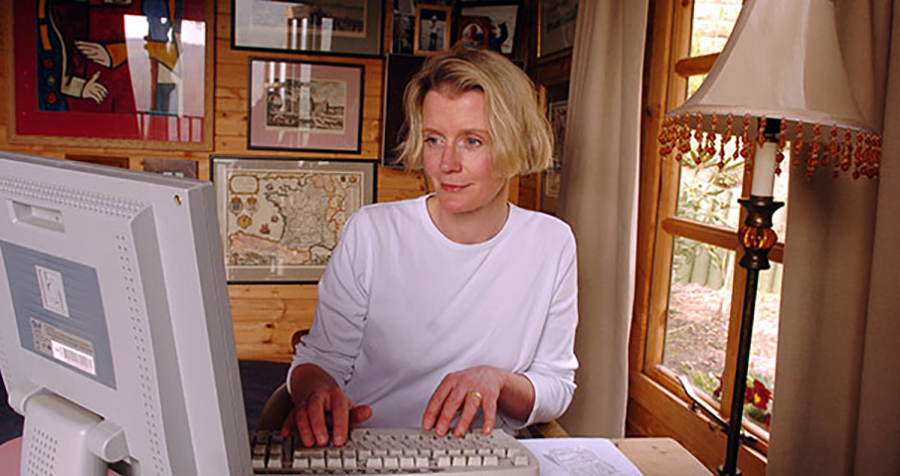 Photograph of Wendy in her writing shed