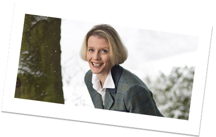 Photograph of Wendy in her garden in the snow
